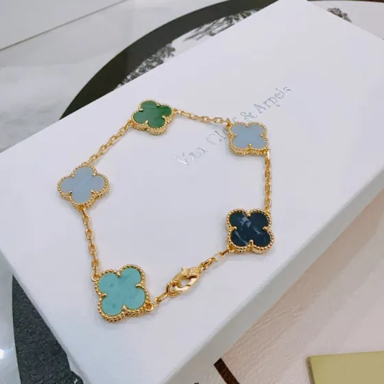 Van Cleef Arpels Alhambra bracelet Yellow gold with green malachite light blue chalcedony dark blue pietersite turquoise four-leaf clover motifs 19cm