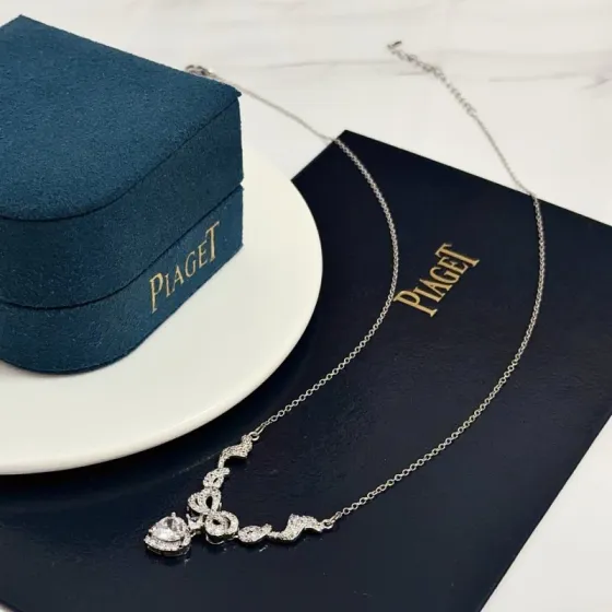 Piaget Heart Bow Diamond Pendant necklace Silver-toned white gold with clear diamond stones 45cm
