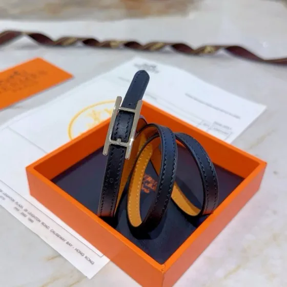 Hermes Anger Forest bracelet palladium silver metal black smooth leather exterior tan leather interior adjustable wrap length