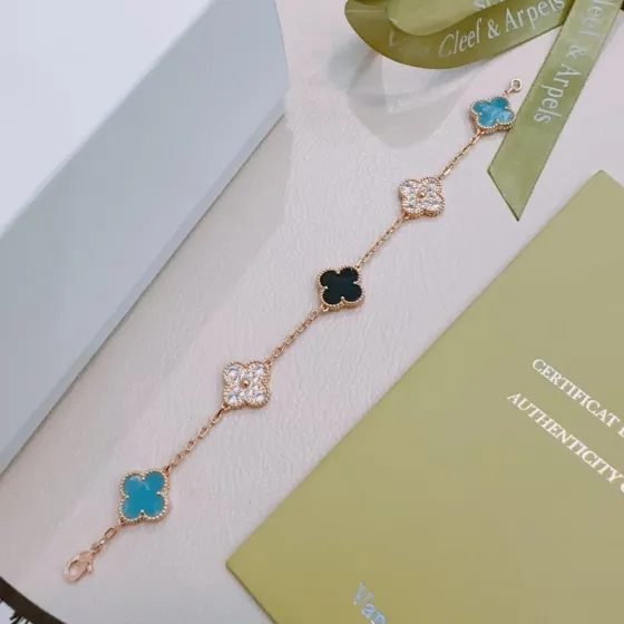 Van Cleef Arpels Alhambra bracelet Rose gold metal with turquoise blue black onyx and clear diamond-accented four-leaf clover motifs 17cm