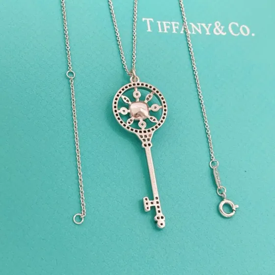 Tiffany Co Tiffany Keys necklace sterling silver with white diamond accents and yellow sapphire center stone 18 inches