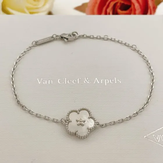 Van Cleef Arpels Lucky Spring Plum Blossom bracelet silver-toned metal with white mother-of-pearl 17cm