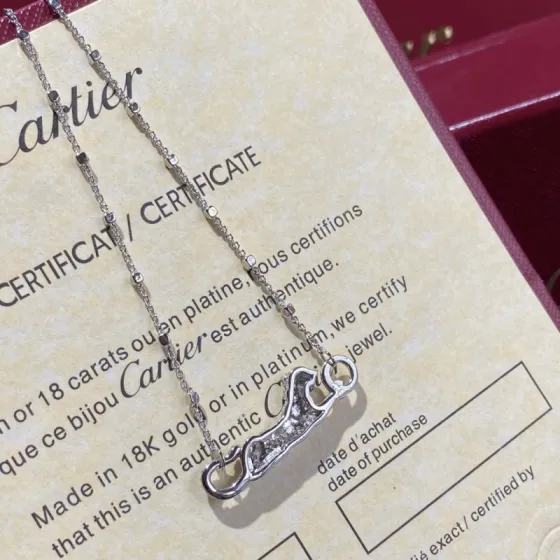 Cartier Panthere de Cartier necklace 18k white gold set with white diamonds black onyx spots green tsavorite garnet eye 42cm