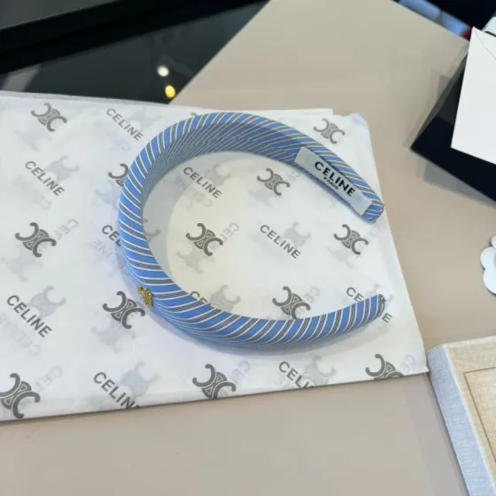 Celine Triomphe Padded Striped Headband brooch Light blue white gray striped fabric with gold-tone Triomphe logo hardware One Size standard headband width 3cm circumference 40cm