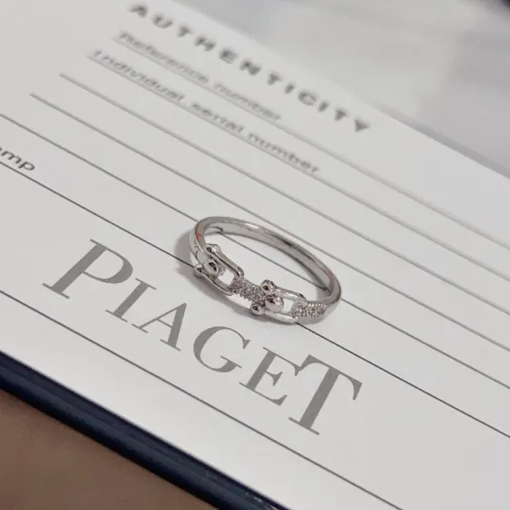 Piaget Possession ring silver white gold with clear diamond accents US 6