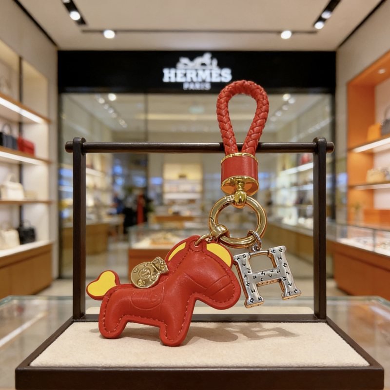 Hermes Rodeo Horse H Logo Key Charm pendant Red leather with yellow accents gold-tone and silver-tone metal hardware 12cm total length