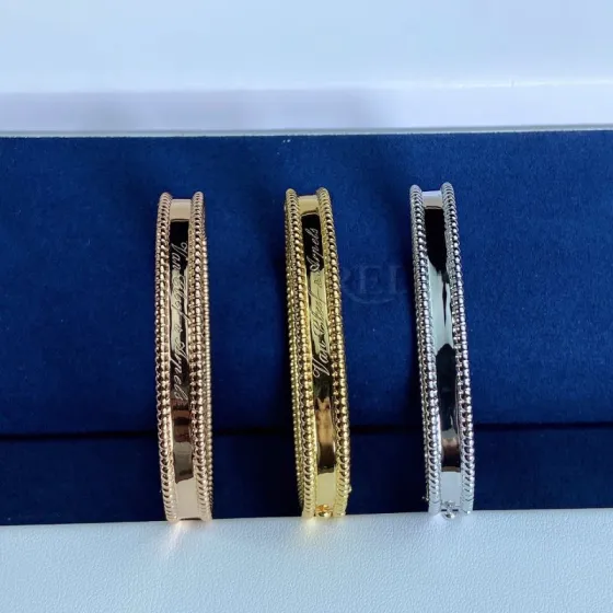 Van Cleef Arpels Perlee signature bangle bracelet 18k rose gold 18k yellow gold 18k white gold no gemstones 17cm inner circumference