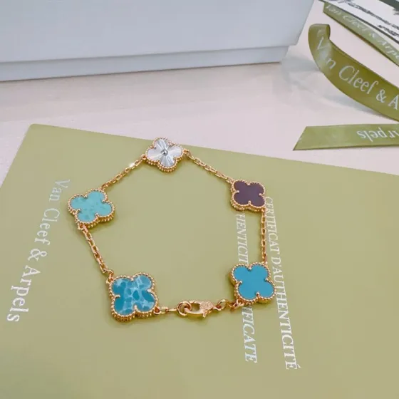 Van Cleef Arpels Alhambra bracelet Rose gold metal with turquoise blue larimar silver guilloche and purple chalcedony clover motifs 17cm