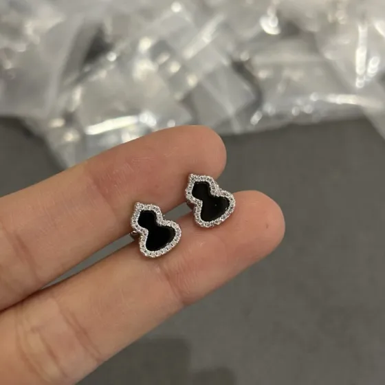 Qeelin Kirin Mini Gourd earrings silver-toned white metal with black onyx inlay and clear diamond accent border mini stud