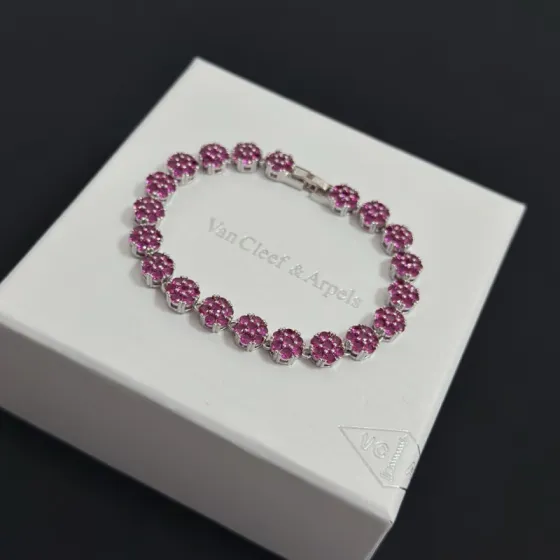 Van Cleef Arpels Four-Leaf Clover bracelet silver-toned metal with fuchsia pink gemstones 18cm