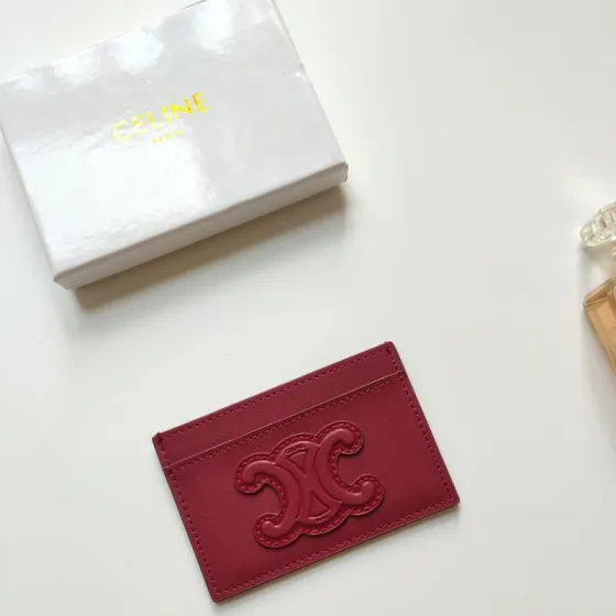 Celine Triomphe card holder Burgundy smooth calfskin leather with matching tone Triomphe logo embossment 7cm x 10 5cm