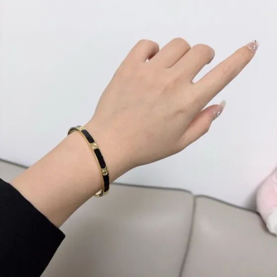 Cartier Love bracelet 18k yellow gold with black lacquer inlay 17