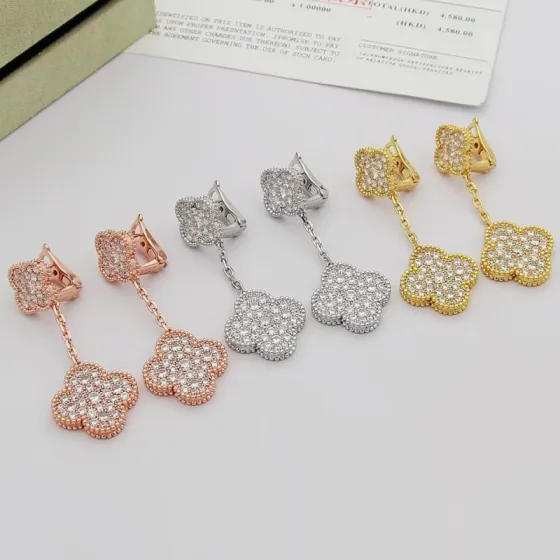 Van Cleef Arpels Magic Alhambra earrings 18k rose gold 18k yellow gold 18k white gold with clear pave diamonds 3cm drop length