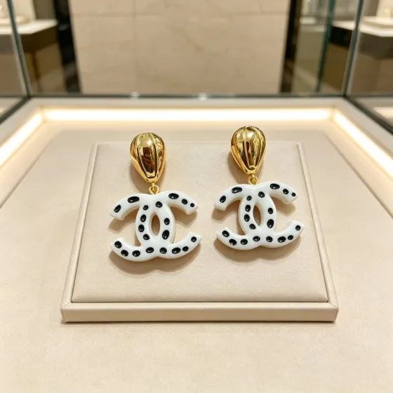 Chanel CC Drop Earrings Polka Dot earrings gold tone metal white resin with black polka dot accents 4 5cm drop length