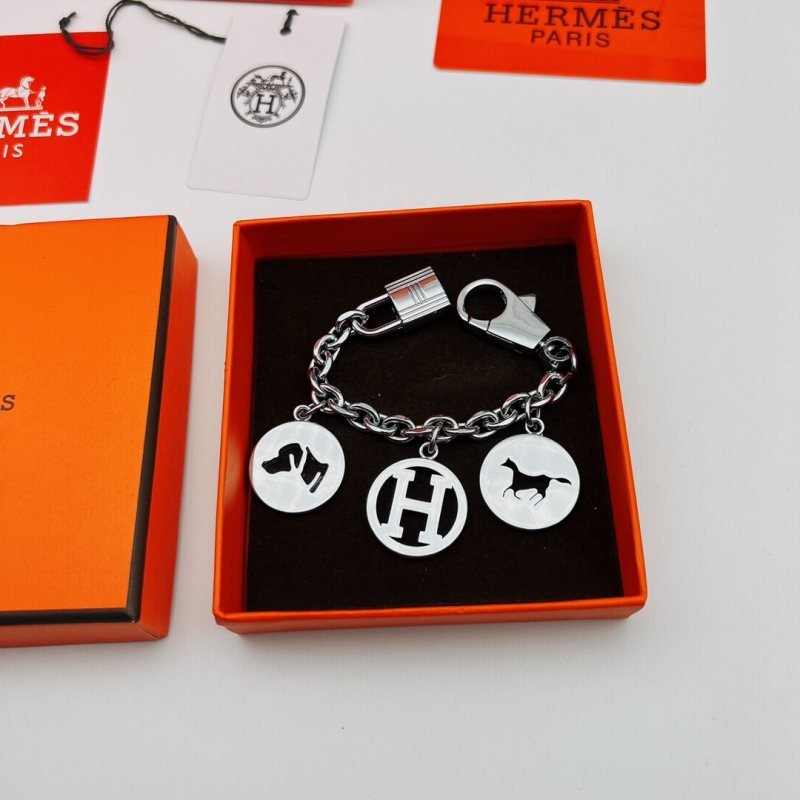 Hermes H Logo Equestrian Dog Horse Charm Breloque bracelet Silver-toned palladium metal with black cutout detailing on charms 18cm
