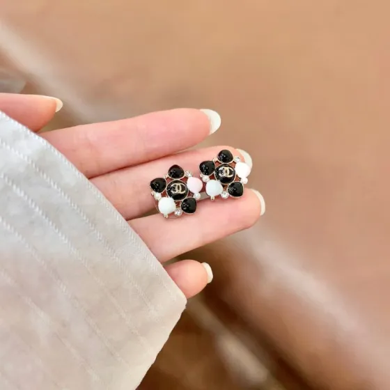 Chanel CC Logo Heart Enamel Flower Stud Earrings earrings Gold-tone metal with black white light pink enamel and clear crystal accents 1 5cm diameter