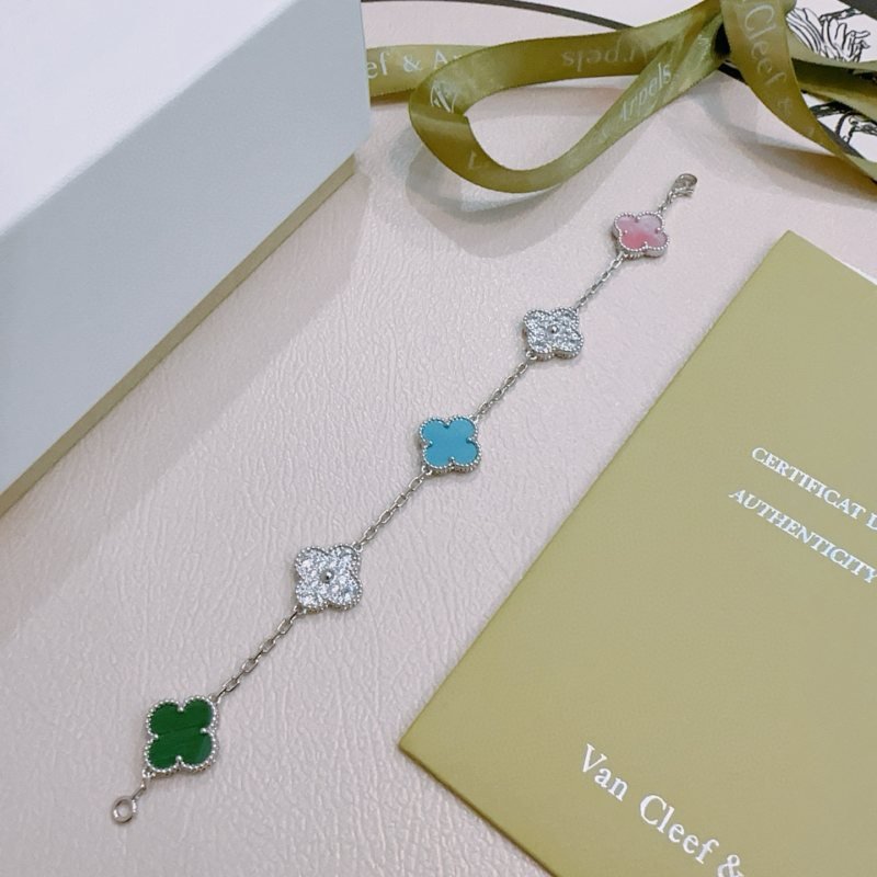 Van Cleef Arpels Alhambra bracelet Silver-toned metal with green malachite pink mother-of-pearl turquoise blue and clear diamond-paved four-leaf clover motifs 18cm