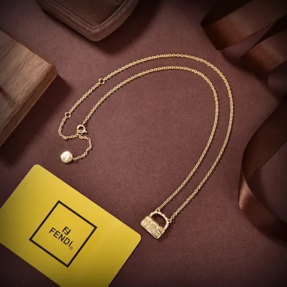 Fendi Baguette Bag Pendant necklace gold-tone metal with white pearl accents 45cm