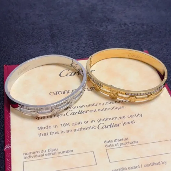 Cartier Love bracelet 18k yellow gold with clear diamond accents 18k white gold with clear diamond accents 17