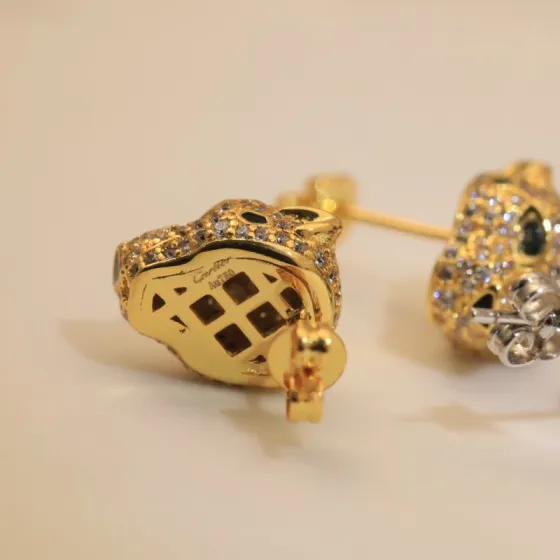 Cartier Panthere de Cartier earrings 18k yellow gold with pave diamonds emerald eyes black onyx accents 8mm stud diameter