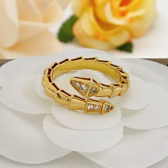 Bvlgari Serpenti Viper ring Yellow gold with clear diamond accents and dark red enamel detailing One size fits all