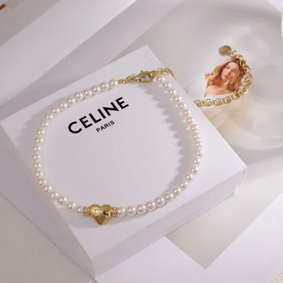 Celine PRECIOUS Heart Pearl bracelet gold-tone metal white pearl clear crystal accents 18cm with 5cm extender chain