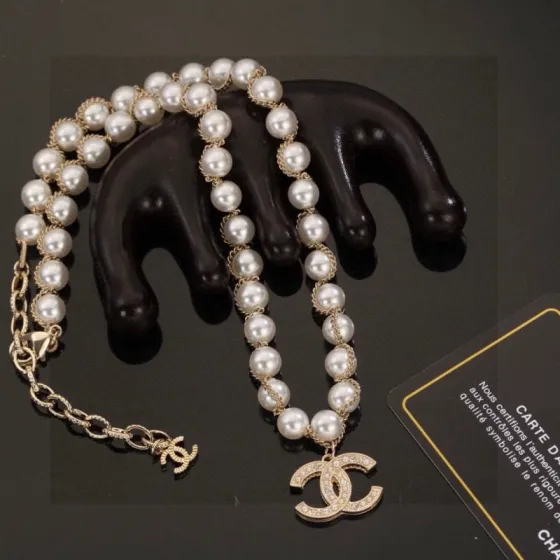 Chanel CC Pearl Charm necklace gold-tone metal white faux pearl clear crystal 42cm