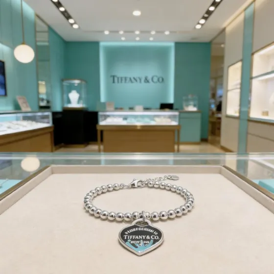 Tiffany Co Return to Tiffany Heart Tag Bead bracelet Silver metal with black and Tiffany blue enamel accents 18cm