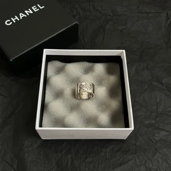Chanel Camellia Logo Wide Band Ring ring Silver-toned metal with black engraved detailing US 7