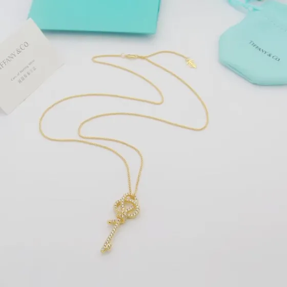 Tiffany Co Tiffany Keys Woven Key necklace 18k rose gold with pave diamonds 18 inches