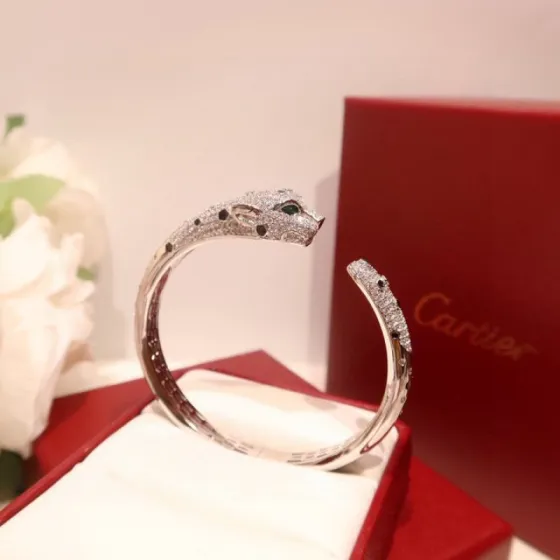 Cartier Panthere de Cartier bracelet 18K yellow gold diamond black onyx tsavorite garnet 17