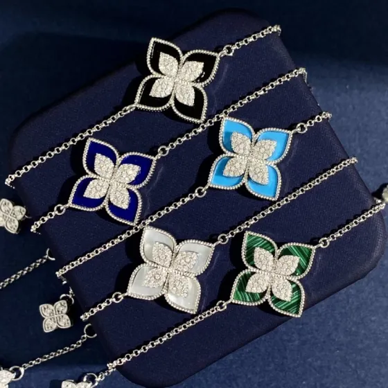 Roberto Coin Princess Flower bracelet Silver-toned white gold with blue enamel and pave white diamonds Yellow gold with green malachite and pave white diamonds Silver-toned white gold with black onyx and pave white diamonds Silver-toned white gold with light blue enamel and pave white diamonds Silver-toned white gold with white mother-of-pearl and pave white diamonds 17cm
