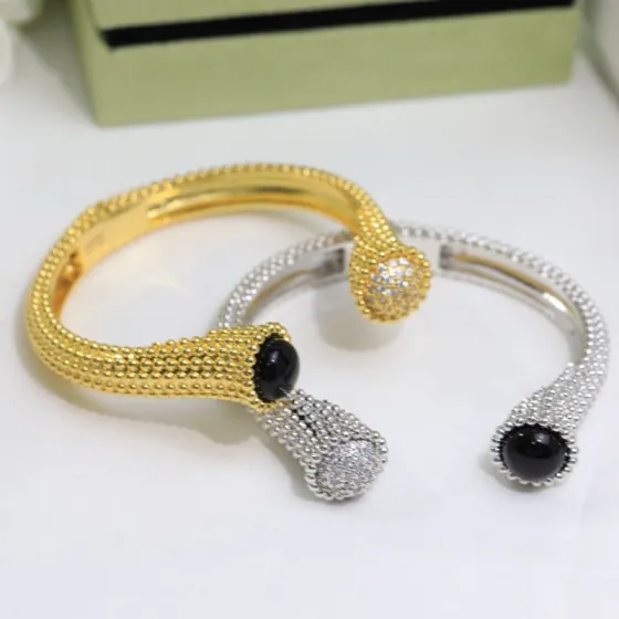 Van Cleef Arpels Perlee bracelet 18k yellow gold with black onyx and pave diamonds 18k white gold with black onyx and pave diamonds 17cm