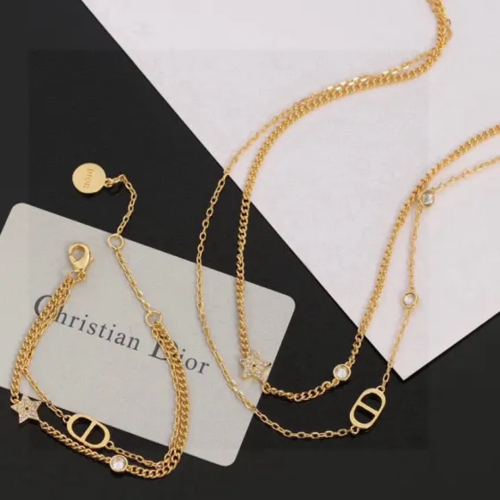 Dior Petit CD Star Double Chain bracelet gold-tone metal with clear crystal accents 16cm with 3cm extender