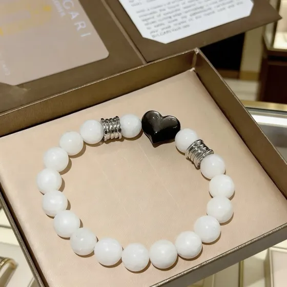 Bvlgari DIVAS DREAM bracelet silver-toned metal with white beads and black heart charm 18