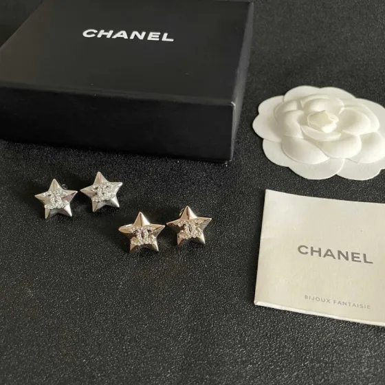 Chanel CC Star Stud Earrings earrings Gold-tone metal with clear crystal accents silver-tone metal with clear crystal accents 1 5cm stud diameter