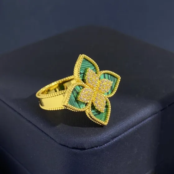 Van Cleef Arpels Idylle Blossom ring Yellow gold with diamond pave available in malachite mother-of-pearl and turquoise stone inlays EU 52