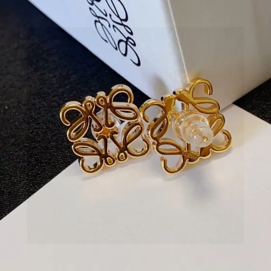 Loewe Anagram earrings gold tone metal 1 2cm stud diameter