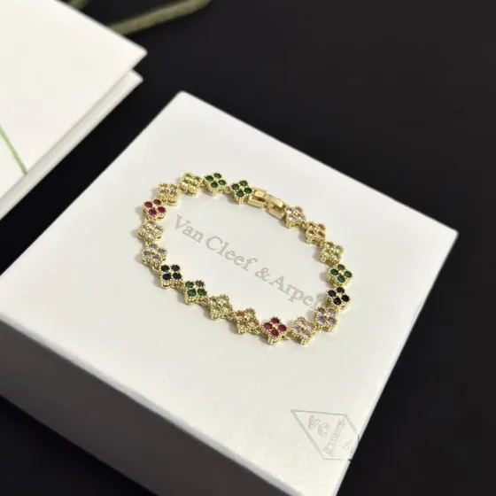 Van Cleef Arpels Alhambra bracelet yellow gold with multicolor gemstones green red black light pink purple champagne 18cm