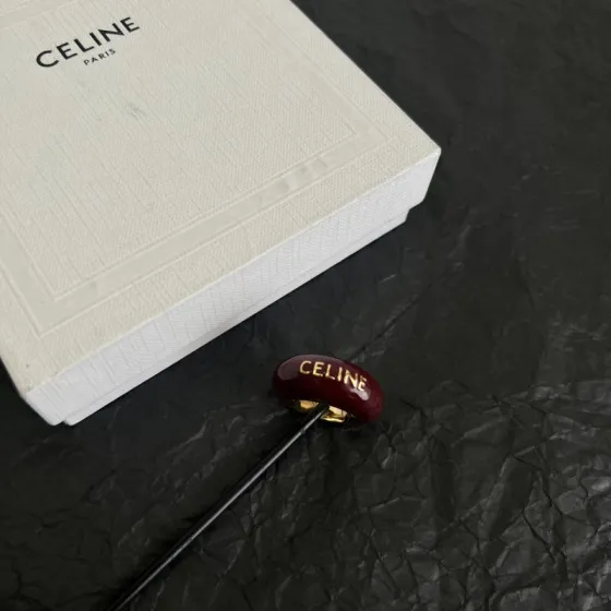 Celine Logo Dome Resin Ring ring Burgundy resin with gold-tone metal white resin with black-tone metal US 7