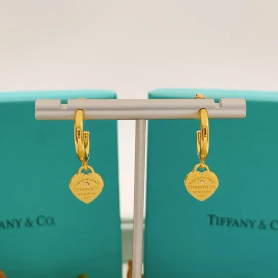 Tiffany Co Return to Tiffany Heart Tag Hoop Earrings earrings gold-tone metal with clear diamond accent 12mm hoop diameter