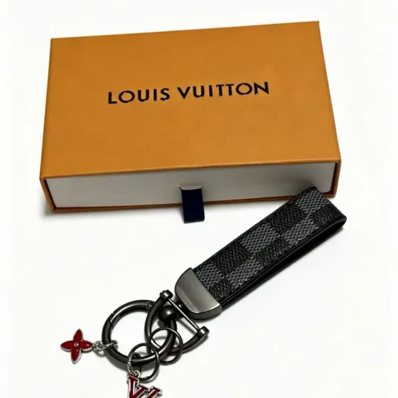 Louis Vuitton Anger Forest Keychain Charm pendant Gunmetal black hardware black graphite damier canvas strap red enamel LV and monogram flower charms with silver tone edging 12cm total length