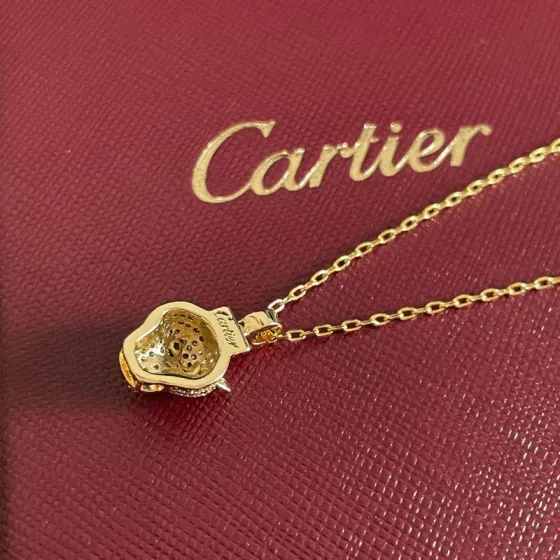 Cartier Panthere de Cartier necklace 18K yellow gold set with pave diamonds green tsavorite garnet eyes blue sapphire accents 40cm