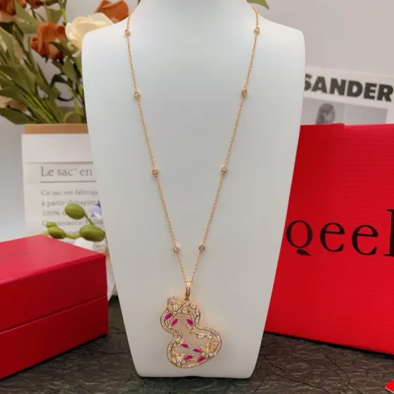 Qeelin Wulu necklace Rose gold metal with clear diamonds and ruby red gemstones 45cm