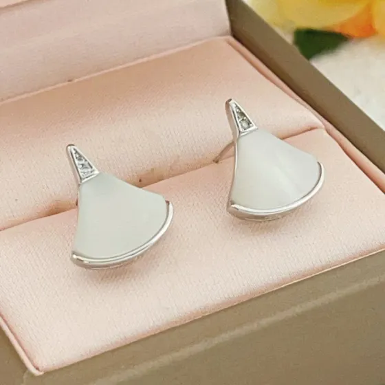 Bvlgari Divas Dream earrings silver-toned metal with white mother-of-pearl and clear diamond accents 1 2cm stud length