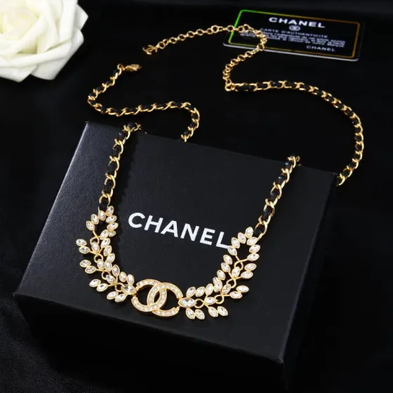 Chanel Goose series crystal leaf CC logo chain necklace gold tone metal with black leather woven chain clear faceted crystal stones 80cm
