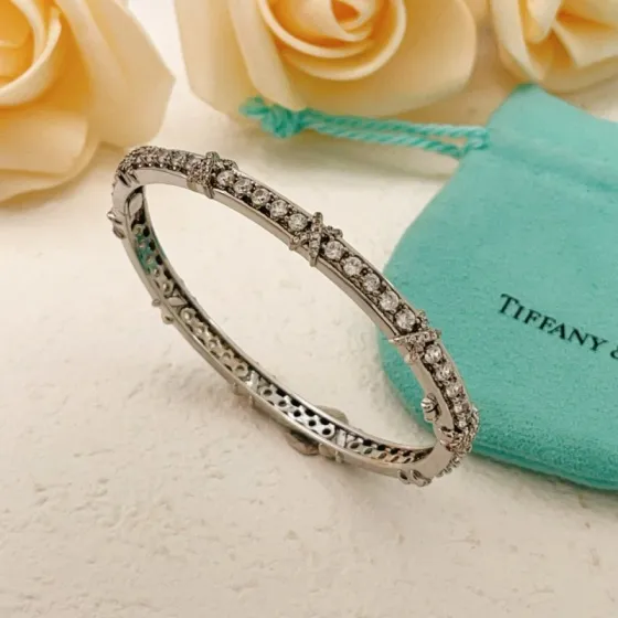 Tiffany Co Schlumberger X bracelet silver-toned white gold with clear diamond accents 17cm inner circumference