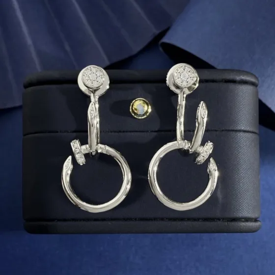 Cartier Juste un Clou earrings Silver-toned metal with clear diamond accents One Size