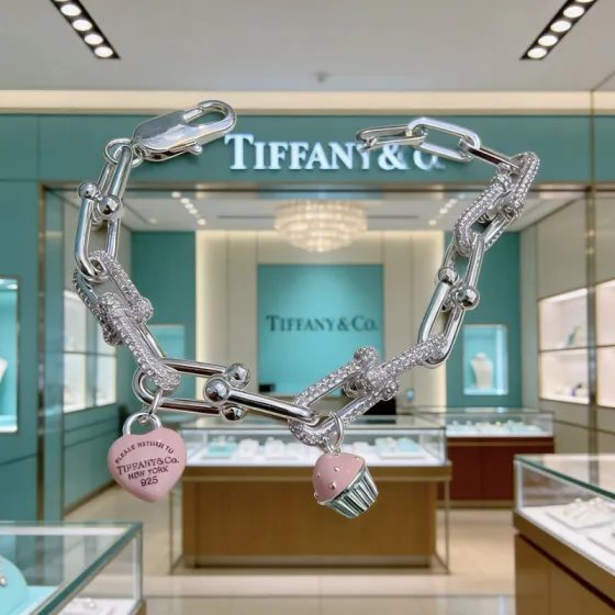Tiffany Co Return to Tiffany HardWear Charm Bracelet bracelet Sterling silver with clear pave diamonds pink enamel heart and cupcake charms 7 inches