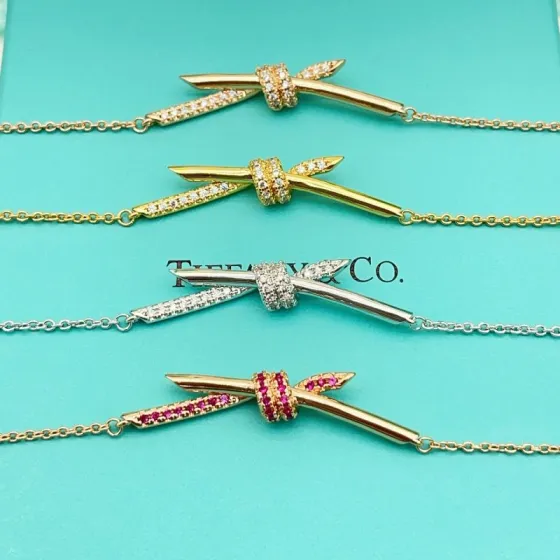 Tiffany Co Knot necklace 18k rose gold with clear diamonds 16 inches